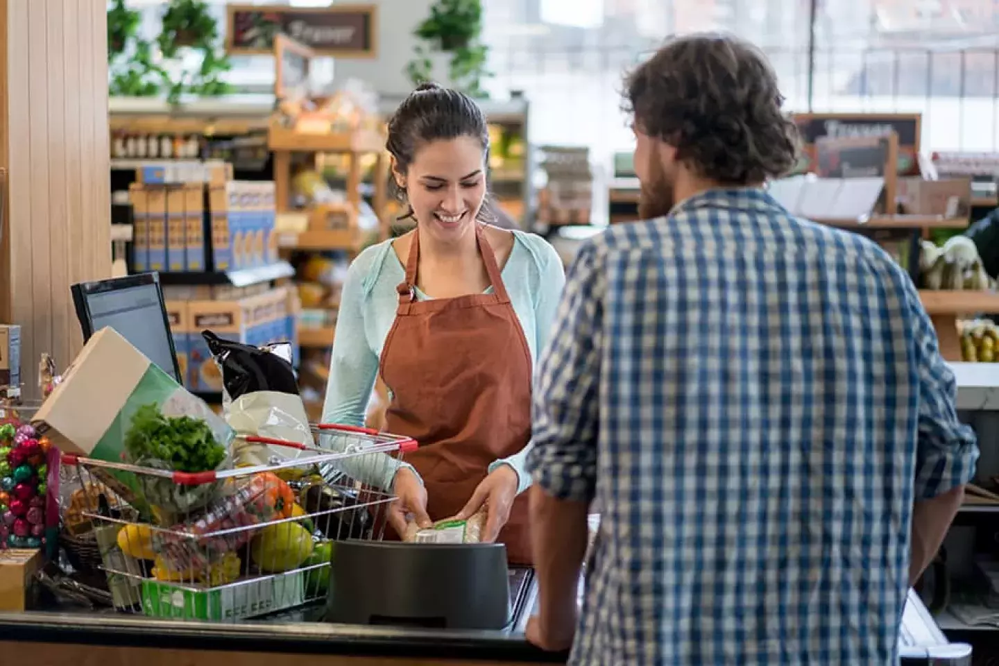 Grocery store transaction at register